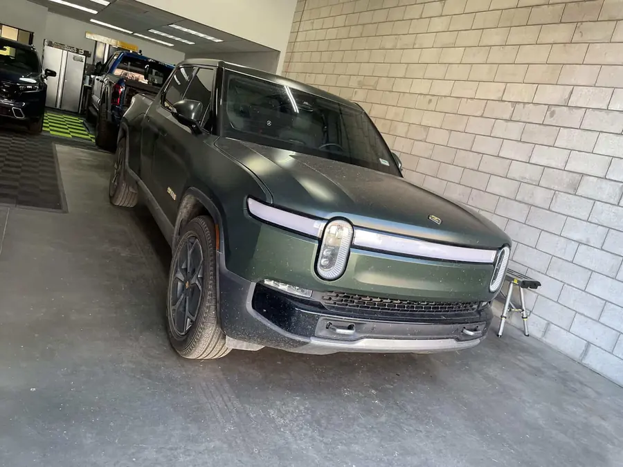 Rivian R1S electric SUV in the KCL Creations shop for paintless dent repair
