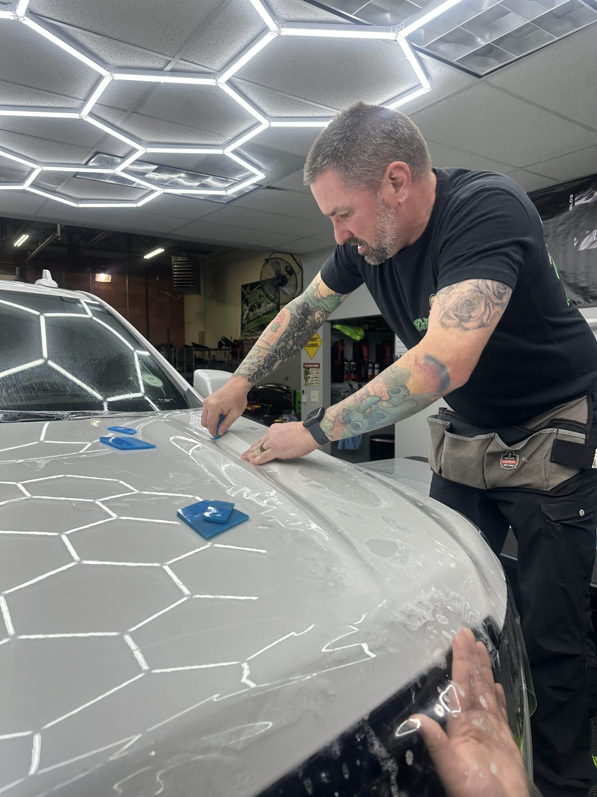 Vehicle receiving paint protection film installation at KCL Creations in Loveland, Colorado
